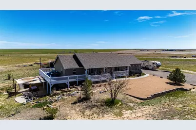 57109 E Kenyon Avenue, Strasburg, CO 80136 - Photo 1