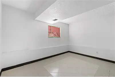 14509 Andrews Drive, Denver, CO 80239 - Photo 16