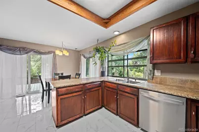 7795 W Ottawa Drive, Littleton, CO 80128 - Photo 10