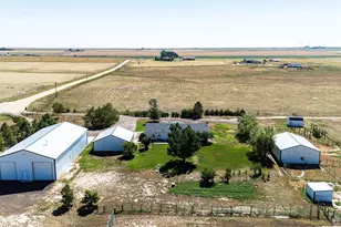 56054 E Virginia Pl, Strasburg, CO 80136 - Photo 2