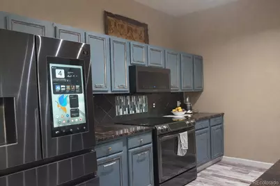 15475 Andrews Drive #304, Denver, CO 80239 - Photo 6