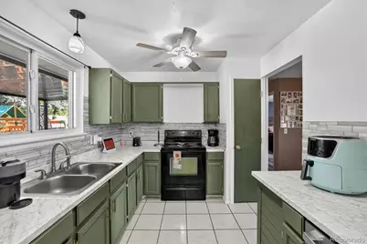 9334 Bellaire Street, Thornton, CO 80229 - Photo 8