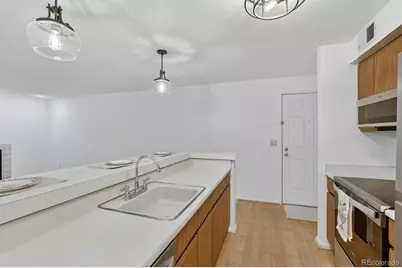 2575 S Syracuse Way #E207, Denver, CO 80231 - Photo 6