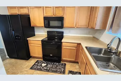 18736 E 57th Place #F, Denver, CO 80249 - Photo 6