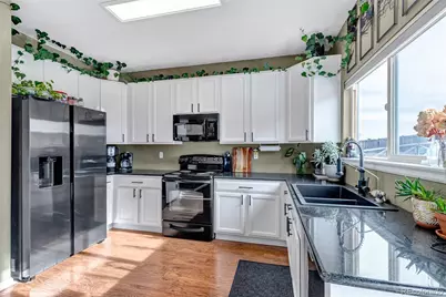 15000 E 116th Drive, Commerce City, CO 80603 - Photo 10