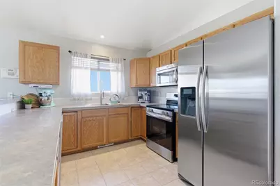 1303 S Harvester Drive, Milliken, CO 80543 - Photo 14