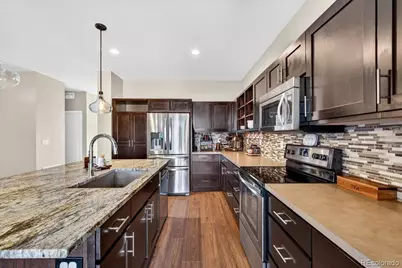 10249 Southlawn Circle, Commerce City, CO 80022 - Photo 14
