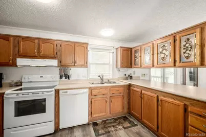 9024 Madeleine Street, Denver, CO 80260 - Photo 18