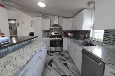 8391 Garfield Circle, Denver, CO 80229 - Photo 6