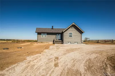 11897 Roxburg Street, Strasburg, CO 80136 - Photo 1