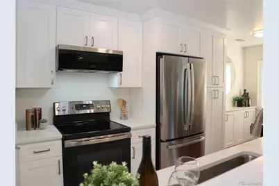 7700 W Glasgow Place #1A, Littleton, CO 80128 - Photo 1