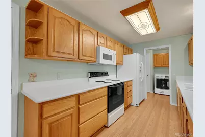7037 S Newland Street, Littleton, CO 80128 - Photo 1