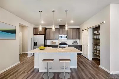 6153 N Ceylon Street #305, Denver, CO 80249 - Photo 1