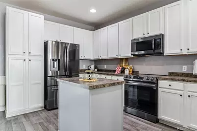 15612 E 96th Way #13E, Commerce City, CO 80022 - Photo 1
