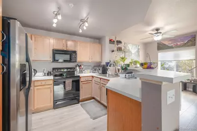 8707 E Florida Avenue #410, Denver, CO 80247 - Photo 1