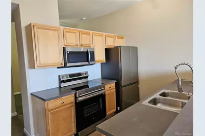 15475 E Andrews Drive #402, Denver, CO 80239 - Photo 1