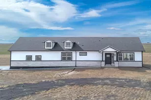 61800 E 32nd Ct, Strasburg, CO 80136 - Photo 1