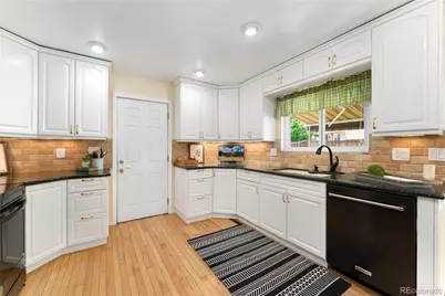 8475 W 74th Drive, Arvada, CO 80005 - Photo 1