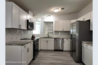 1039 Royal Palm Drive, Barefoot Bay, FL 32976 - Photo 4