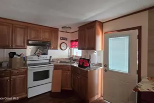 861 Pecan Cir, Barefoot Bay, FL 32976 - Photo 6