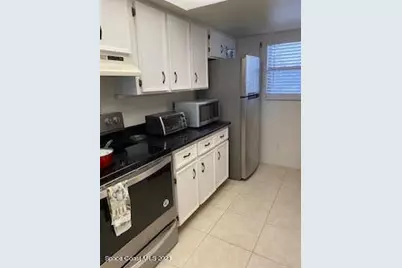 1830 N Atlantic Avenue #205, Cocoa Beach, FL 32931 - Photo 8