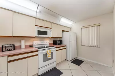 1000 N N Atlantic Avenue #114, Cocoa Beach, FL 32931 - Photo 12