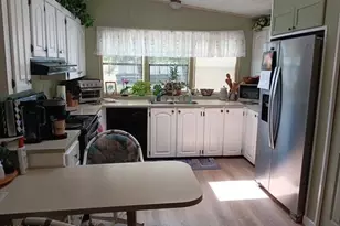 815 Bougainvillea Cir, Barefoot Bay, FL 32976 - Photo 12