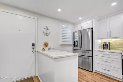 500 Palm Springs Boulevard #408, Indian Harbour Beach, FL 32937 - Photo 4