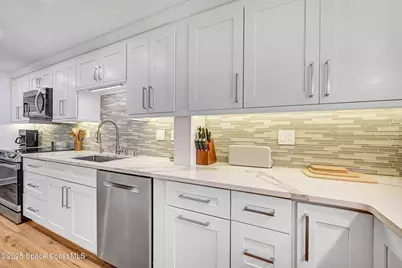 500 Palm Springs Boulevard #408, Indian Harbour Beach, FL 32937 - Photo 12