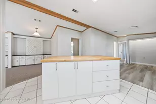 1229 Calusa Dr, Barefoot Bay, FL 32976 - Photo 12