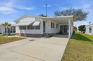 1229 Calusa Dr, Barefoot Bay, FL 32976 - Photo 1