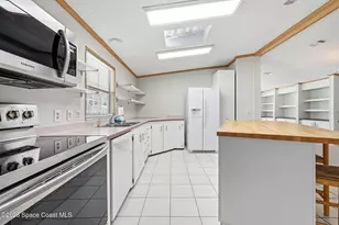 1229 Calusa Dr, Barefoot Bay, FL 32976 - Photo 10