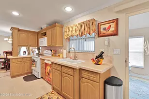 621 Puffin Dr, Barefoot Bay, FL 32976 - Photo 10