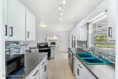 933 Waialae Circle NE, Palm Bay, FL 32905 - Photo 8