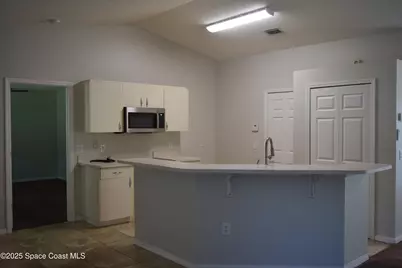 939 Lyons Circle NW, Palm Bay, FL 32907 - Photo 6