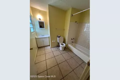 1057 S Deleon Avenue S #B, Titusville, FL 32780 - Photo 6