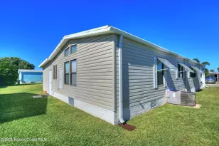 561 Dolphin Cir, Barefoot Bay, FL 32976 - Photo 4