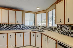 561 Dolphin Cir, Barefoot Bay, FL 32976 - Photo 20