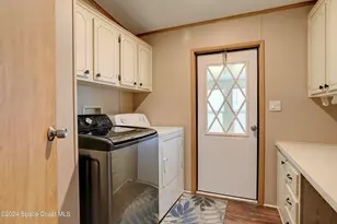 561 Dolphin Cir, Barefoot Bay, FL 32976 - Photo 32