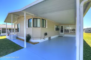 561 Dolphin Cir, Barefoot Bay, FL 32976 - Photo 6