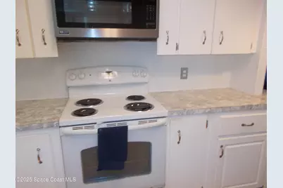 836 Hyacinth Circle E, Barefoot Bay, FL 32976 - Photo 4