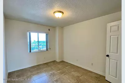 3740 Ocean Beach Boulevard #305, Cocoa Beach, FL 32931 - Photo 12