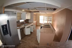 1056 Wren Cir, Barefoot Bay, FL 32976 - Photo 14