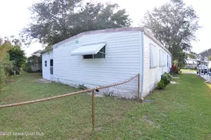 1056 Wren Cir, Barefoot Bay, FL 32976 - Photo 8