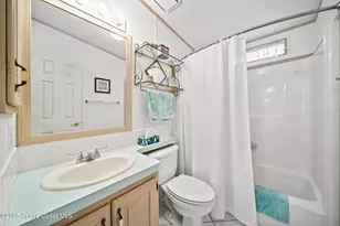 720 Periwinkle Cir, Barefoot Bay, FL 32976 - Photo 22