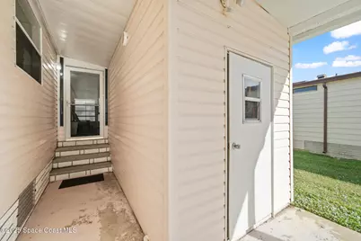 720 Periwinkle Circle, Barefoot Bay, FL 32976 - Photo 4