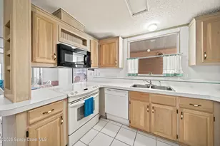 720 Periwinkle Cir, Barefoot Bay, FL 32976 - Photo 12