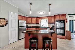 729 Gladiolus Dr, Barefoot Bay, FL 32976 - Photo 4