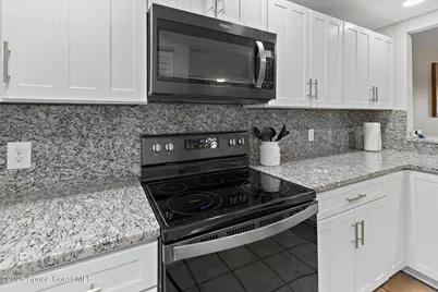 3160 N Atlantic Avenue #A106, Cocoa Beach, FL 32931 - Photo 12