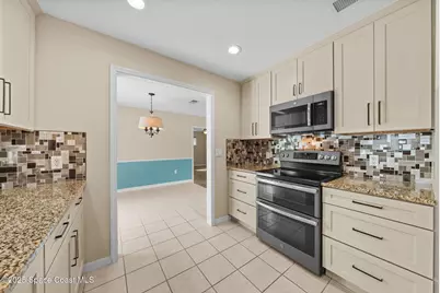 5989 Barna Avenue, Titusville, FL 32780 - Photo 6